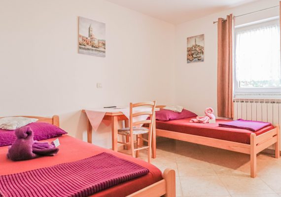 Doppel- oder Zweibettzimmer